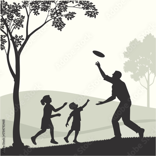 Father and children playing frisbee in a park silhouette