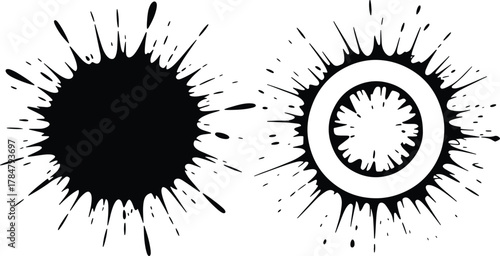 Black ink splatters or stains abstract design on a white backdrop