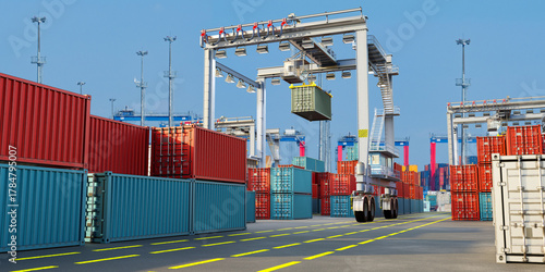 Billede på lærred Cargo handling at a modern shipping terminal with cranes loading containers for global transport