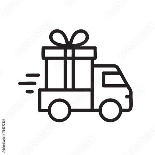 a delivery truck carrying a large gift box with a bow on top swiftly moving