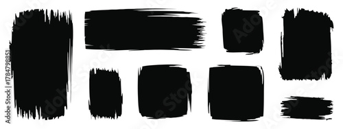Assorted Black Paint Brush Strokes and Shapes on White Background vector illustration