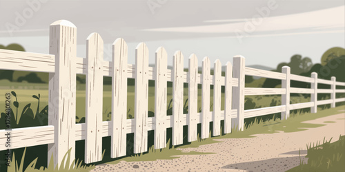 White picket fence along gravel path in rural landscape