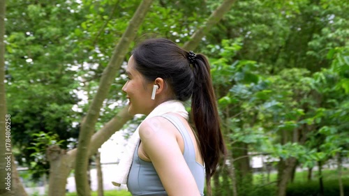 Asian women are stretching their muscles before going out to run to the park, Outdoor shot of smiling fitness woman stretching and working out, workout morning healthy lifestyle, smiling sport woman