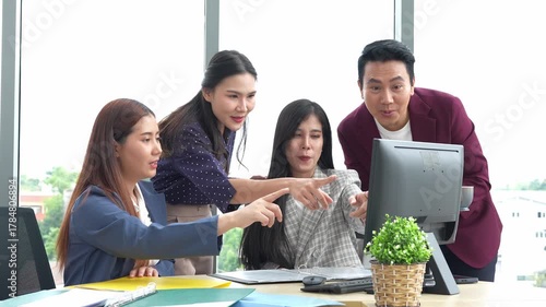 Asian entrepreneur group collaborates in office, fostering teamwork and cooperation to achieve their startup objectives. Their positive partnership drives success, creating a happy and successful job