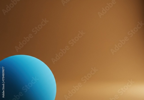 A vibrant blue abstract form rests on a warm, textured brown background, creating a peaceful and harmonious color contrast ,simple ,design ,balance