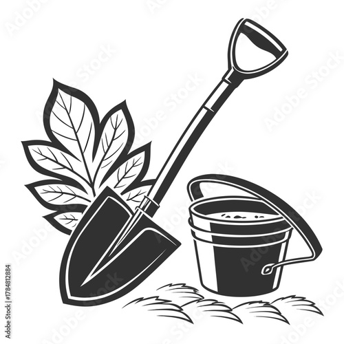 Gardening tools including a shovel and bucket with leaves