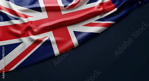 Waving Union Jack Flag Against Dark Blue Background