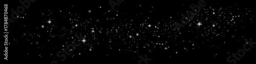 The dust sparks and golden stars shine with special light. Vector sparkles on a transparent background. Christmas light effect. Sparkling magical dust