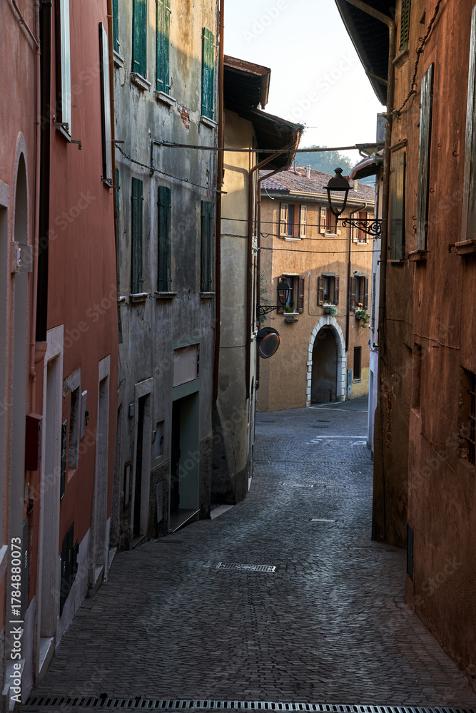 Fototapeta premium Narrow Street and Stone Buildings in San Felice del Benaco