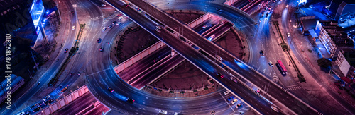 Expressway, Self-driving autonomous electric cars of the future with elements move along a busy traffic intersection. Artificial Intelligence, Car Scan, GPS Tracking, Smart Roads, IoT, highway