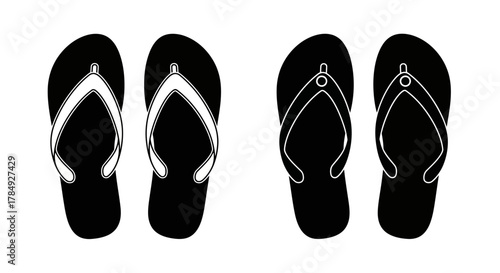 four pairs of black flip flops neatly arranged side by side