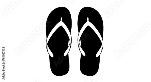 a pair of black flip flops with white straps neatly placed side by side
