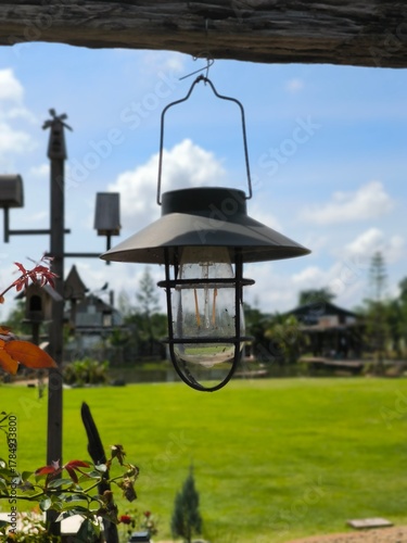 Hanging lanterns illuminate the garden