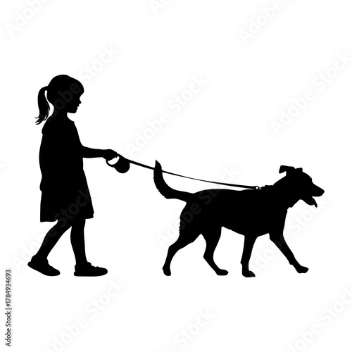 The silhouette of a little girl walking with her pet dog.