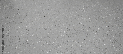 Seamless grey epoxy terrazzo garage floor texture
