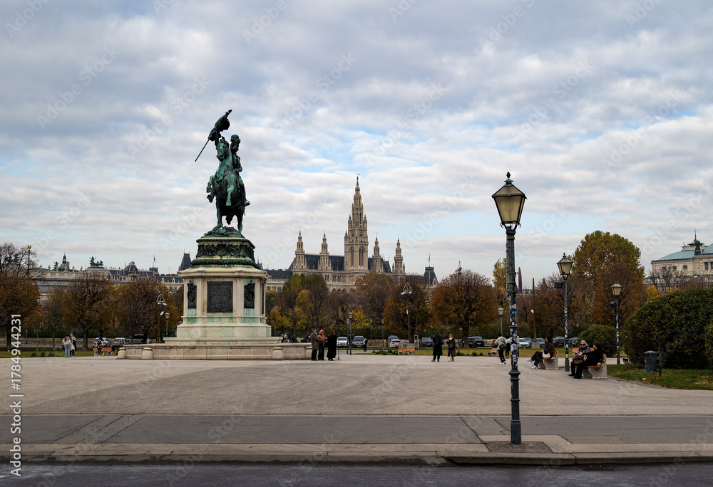 Fototapeta premium View of Vienna City Hall from the Hofburg across the autumn park