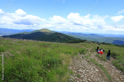 Fototapeta Naklejka Na Ścianę i Meble -  Group of tourist hiking in Bieszczady Mountains, Poland