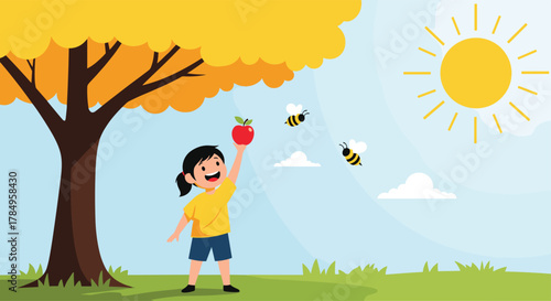 A young child reaches for a ripe red apple hanging from a tree on a sunny day.