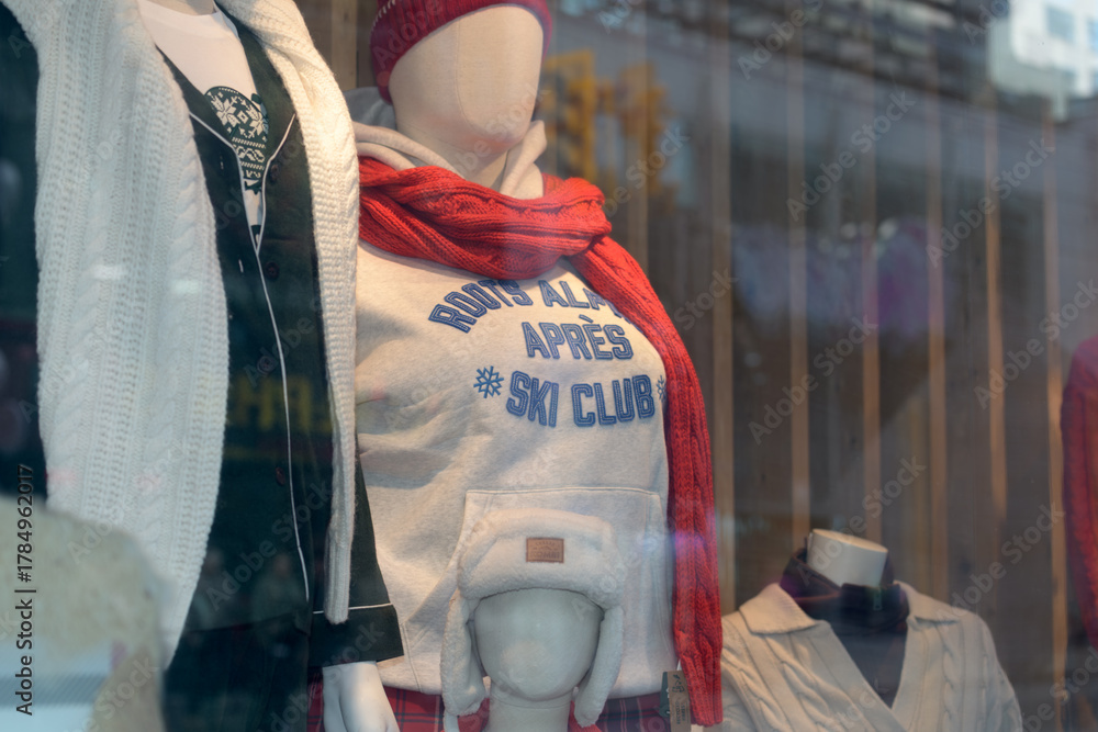 Fototapeta premium mannequins inside display window of Roots, a clothing store, located here at 220 Yonge St, Unit C 32, Floor 3, CF Toronto Eaton Centre
