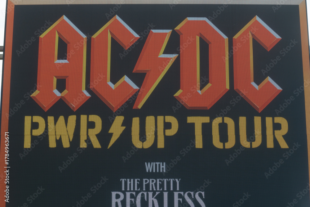Fototapeta premium close-up of Exhibition Place digital roadside billboard featuring a concert promotion for AC/DC PWR/UP Tour (September 16, 2026 in Toronto)