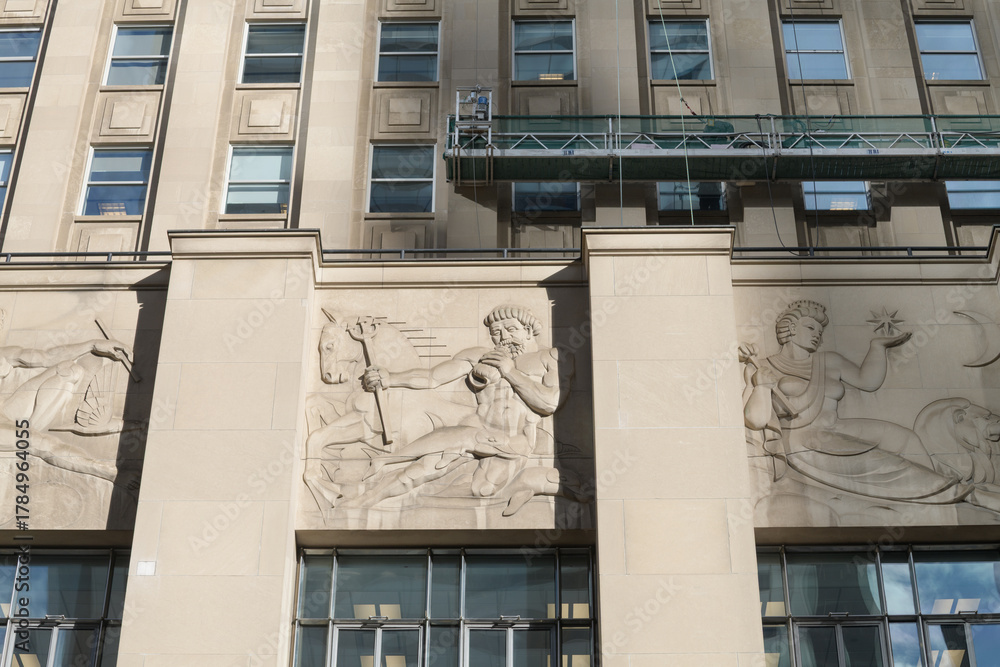Obraz premium bas relief stone panels by Frederick Winkler on the exterior of the historic Bank of Nova Scotia (Bay St side), Toronto