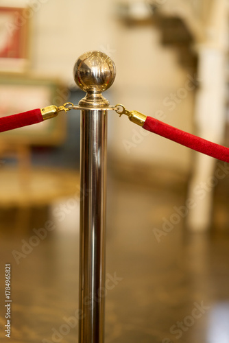 Obraz na plátně Velvet rope stanchion in a hotel
