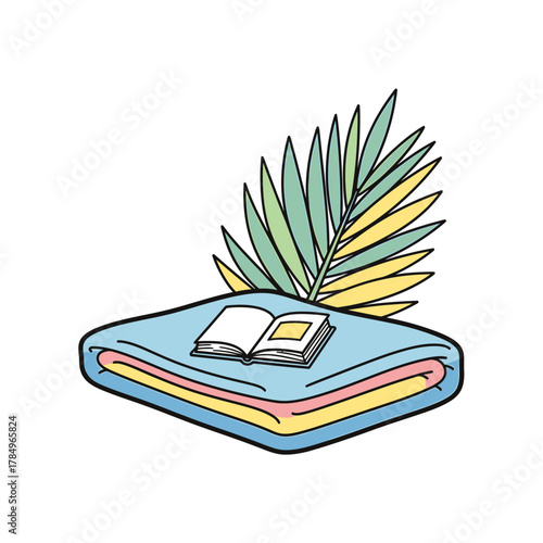An open book rests on a folded blanket with a palm frond behind it.