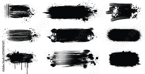 Collection of black ink brush stroke splatters and paint smears, abstract textured elements for design