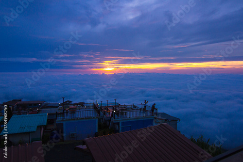 light of sunrise with sea of mist