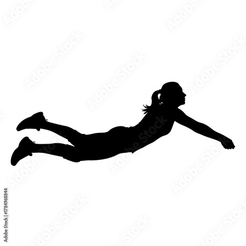 Dynamic silhouette of a determined volleyball player diving for the ball, action shot, athletic female, sports competition, competitive spirit, power and grace