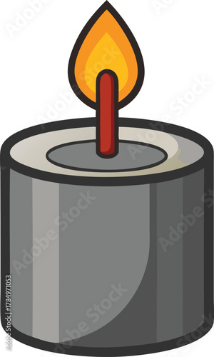 Close up of a lit tealight candle with a warm flame