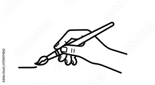 a hand holding a paintbrush delicately touching canvas