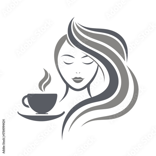 Elegant woman with flowing hair enjoying a cup of coffee