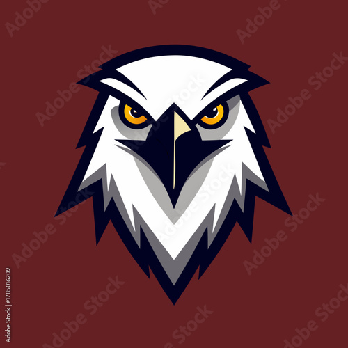 Fierce eagle head emblem with intense yellow eyes and sharp beak on maroon background