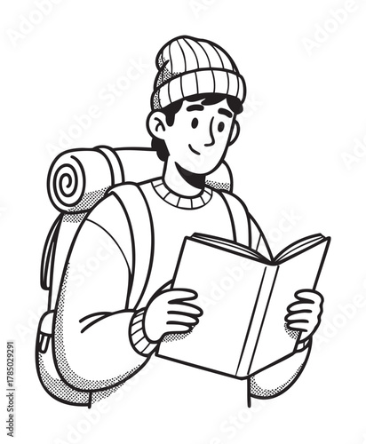 Young caucasian male with a winter hat and backpack reads a book, suggesting interest in literature, travel, or exploration.