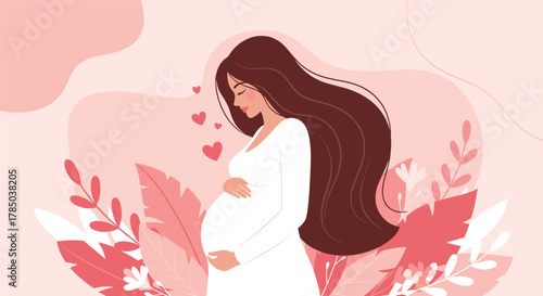 Beautiful pregnant woman with long flowing hair embracing her baby bump with love surrounded by soft pink foliage and floating hearts.