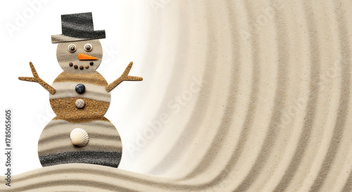 Playful snowman made of sand on wavy background  