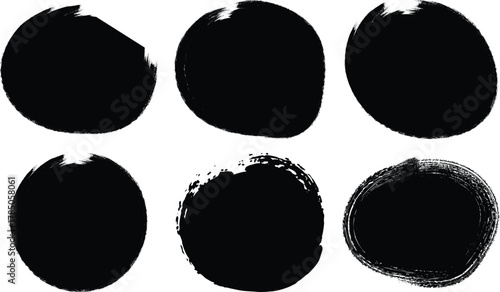 Six abstract black grunge oval shapes with rough edges isolated on transparent background