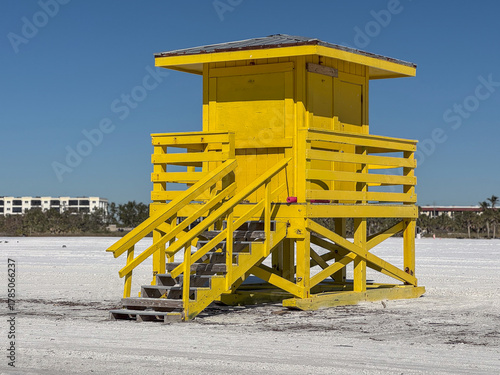 yellow lifeguard tower on the beach