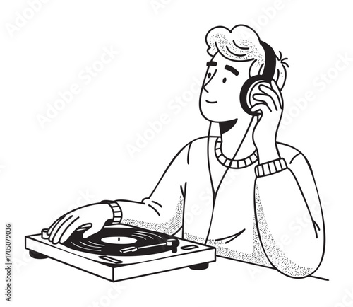 Young caucasian male dj wearing headphones operates a turntable, demonstrating focus and engagement with music.