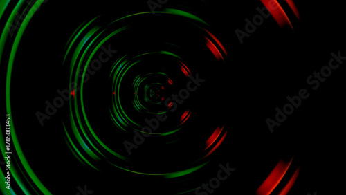Abstract vortex of green and red concentric circles on black background perfect for scifi themes and psychedelic visuals futuristic and modern design element for posters or backdrops