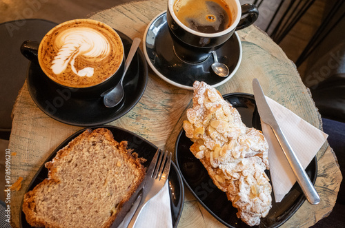 Coffee and pastries on rustic table
