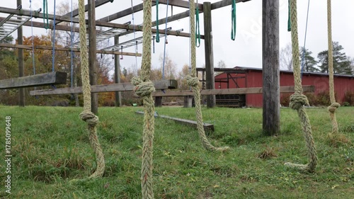 Outdoor gym with ropes but no people