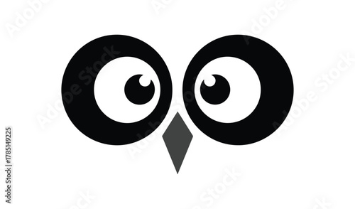 Whimsical cartoon owl eyes and beak on white background