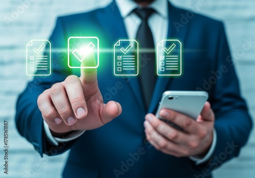 Wallpaper Mural Businessman s hand selecting a digital document icon on a futuristic interface with a smartphone in the other hand Torontodigital.ca