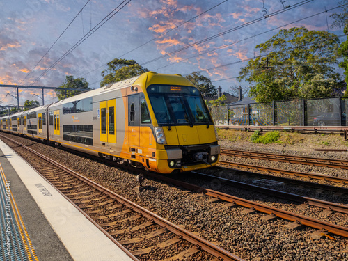 Photography Passenger Train going through Summer Hill train station a suburban Sydney train