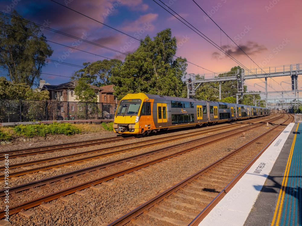 Fototapeta premium Passenger Train going through Summer Hill train station a suburban Sydney train Station NSW Australia