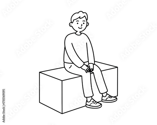 Young man sitting on a minimalist cube, looking content and relaxed