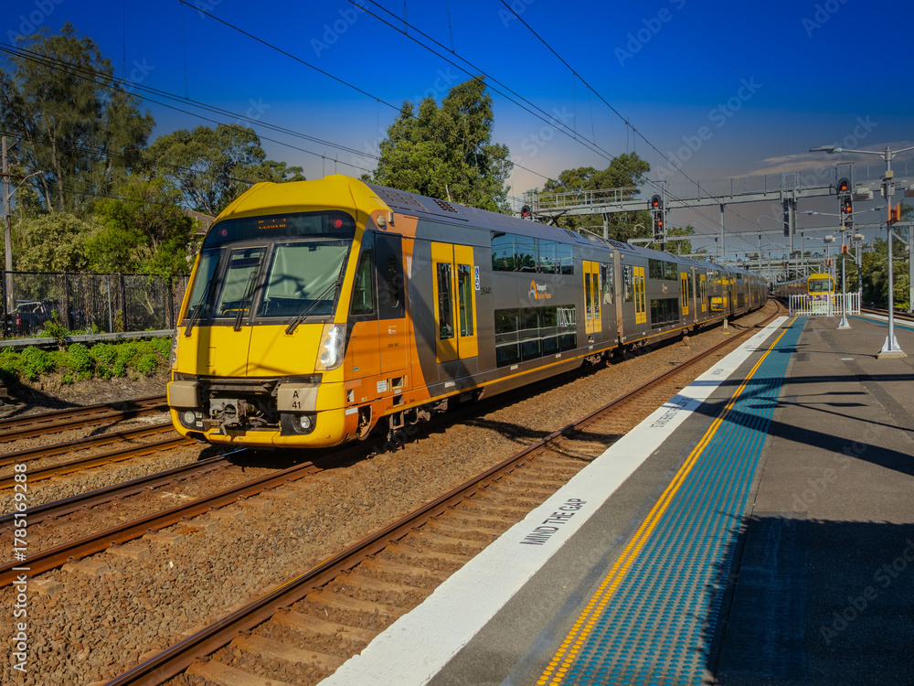 Naklejka premium Passenger Train going through Summer Hill train station a suburban Sydney train Station NSW Australia