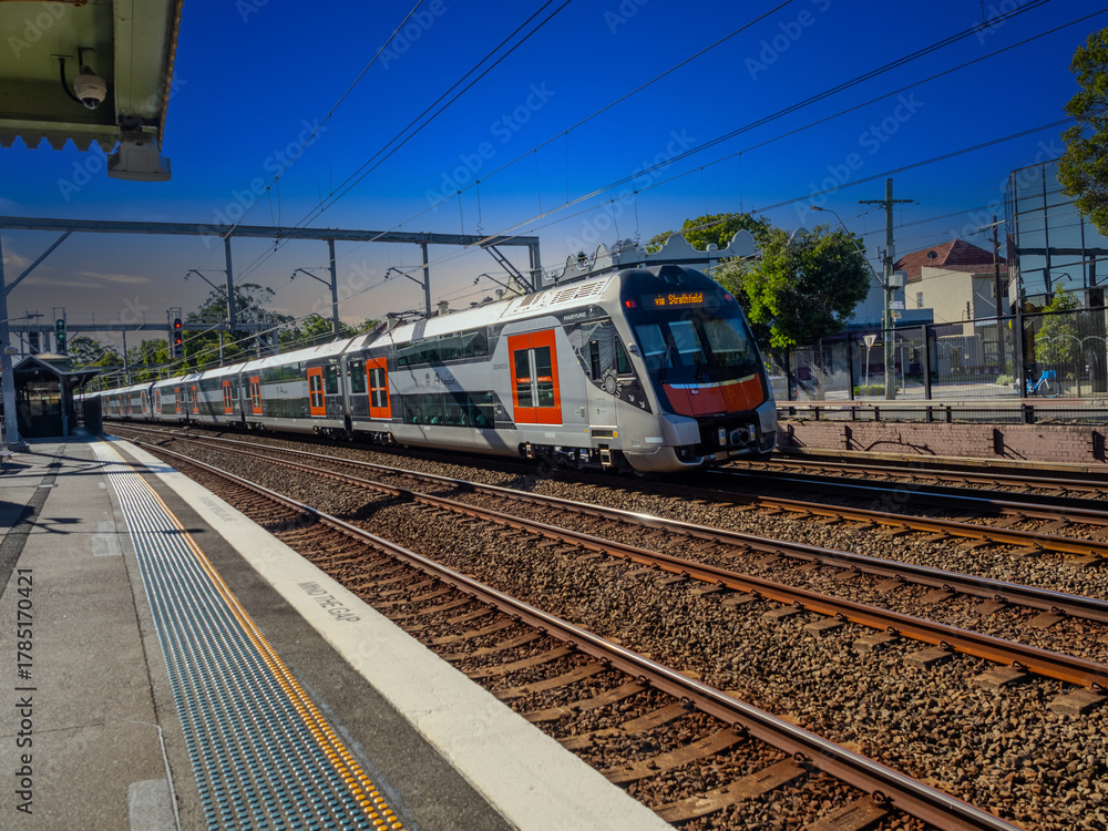 Fototapeta premium Passenger Train going through Summer Hill train station a suburban Sydney train Station NSW Australia